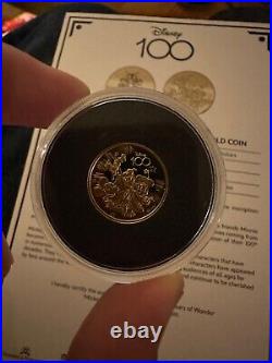 DISNEY 100 24 karat gold layered coins, And one in. 999 gold coin disney family