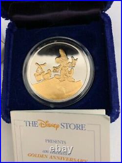 Disney's Fantasia 50th Anniversary. 999 Silver with 22K Gold Coin Sorcerer Mickey