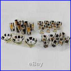 Extensive Set of 22-Karat Gold and Black Coin Barware and Glasses by Cera MCM