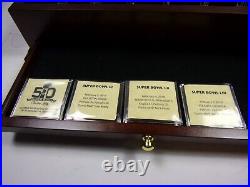 PREOWNED NFL SUPERBOWL COMMEMORATIVE 4 GOLD COIN COLLECTION WithCASE & CERTS