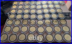 Set of 57 Disney World 50th Anniversary Golden Medallion Coins