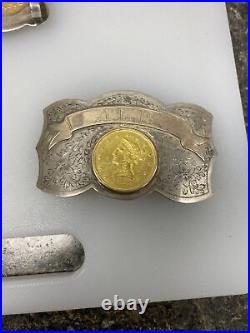 Sterling silver rodeo buckle with A 10 dollar gold coin