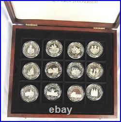 The Queen Mother Silver and Gold Coin Collection 106 proof coins in wooden cases