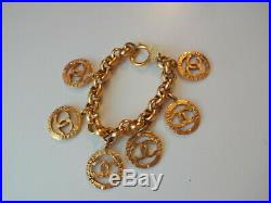 Vtg RARE Collectable CHANEL Gold Plt 6 Charms CC Logo Coins Chain Bracelet